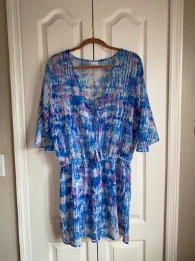 BCA, by Rebecca Virtue Blue & Lavender Tie-Dye cover up is a Women’s Size Large.